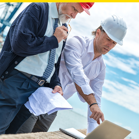 Men discussing design of insulation