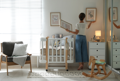 Woman in baby room