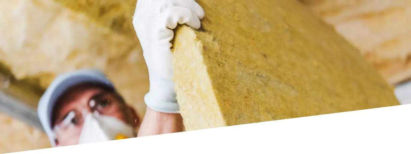 Man working with mineral wool