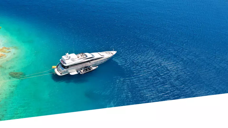 Yacht near tropical island